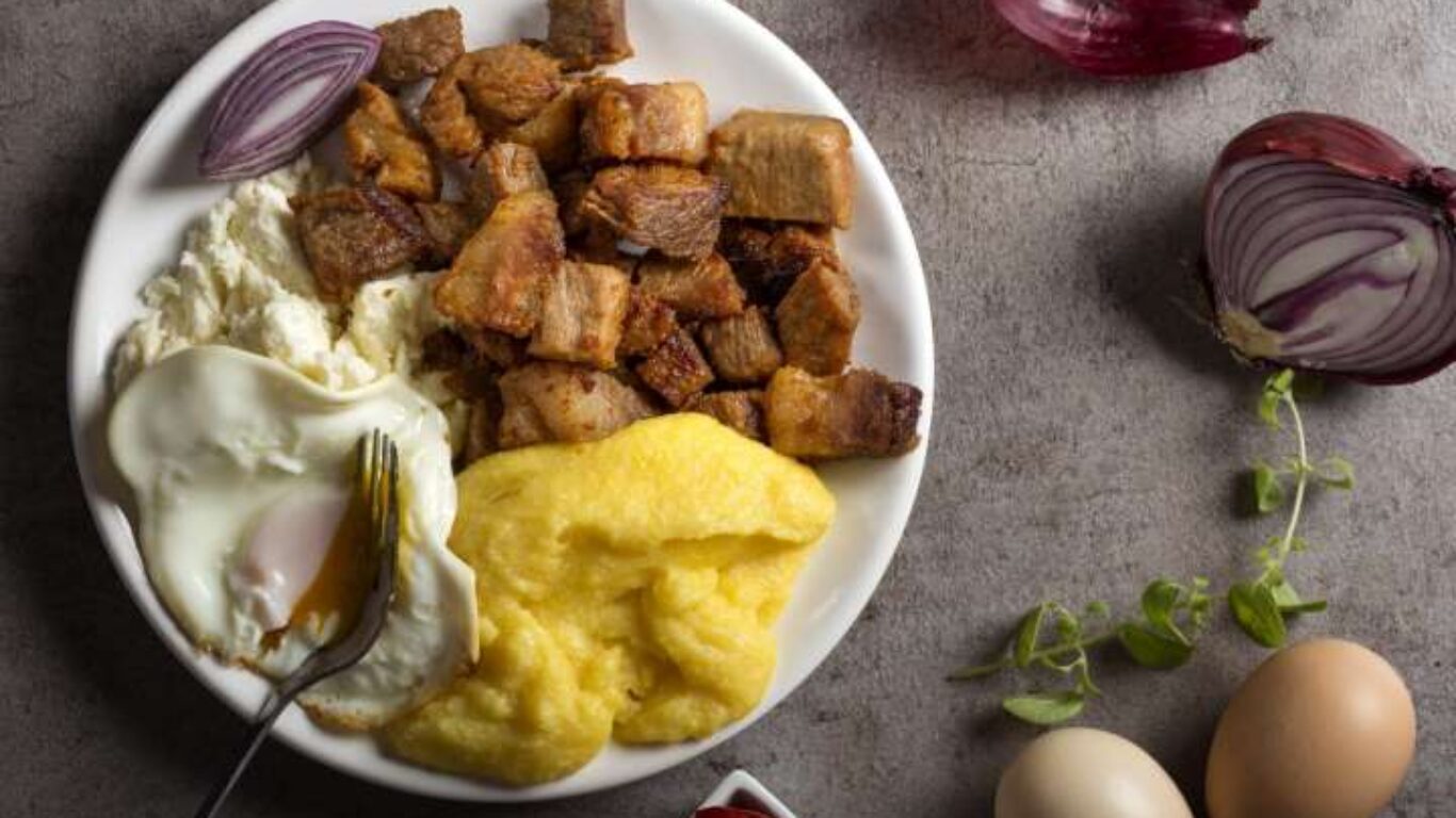 Traditional Romanian food „Tochitura Moldoveneasca” made with po Traditional Romanian food „Tochitura Moldoveneasca” made with po