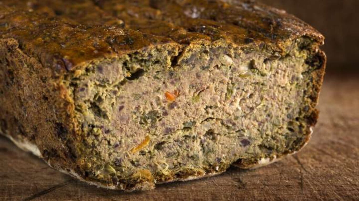 Romanian traditional food called Drob made from meatloaf on wood Romanian traditional food called Drob made from meatloaf on wood